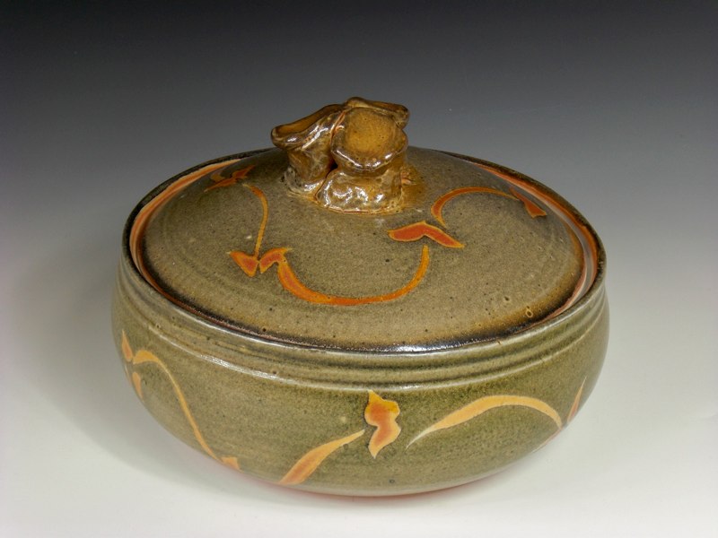 Ceramic casserole with a shino glaze by Marcia Halperin