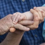 Three generations of hands