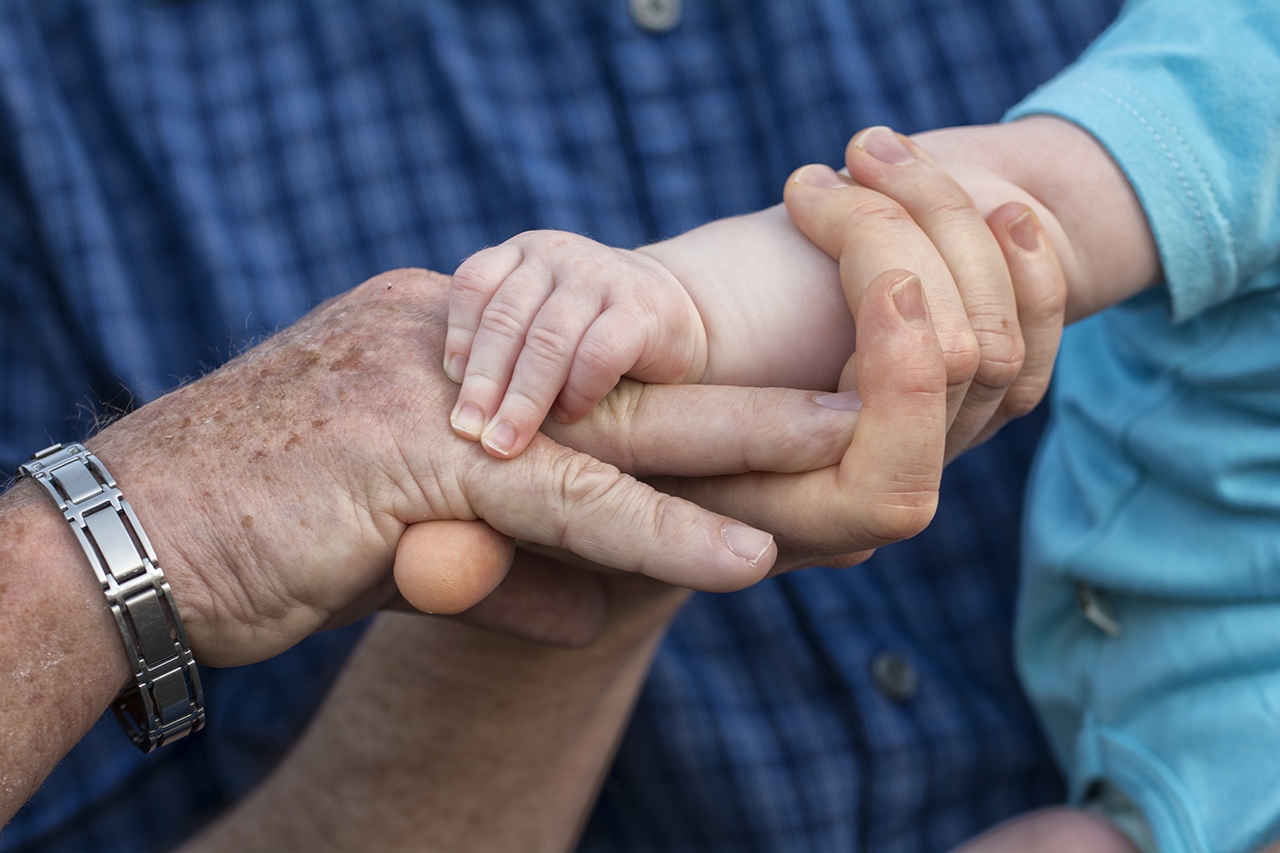 Three generations of hands